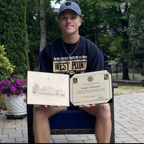 Brendan Brannock, 12, holding his acceptance letter to West Point.