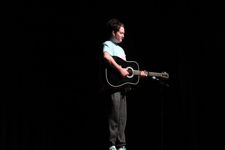 Dylan Gamino, 12, first place winner performing his original song.
