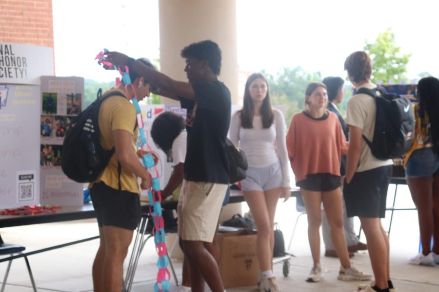 Trey Wilson, 12, at the iLead Club table at the Club Fair.