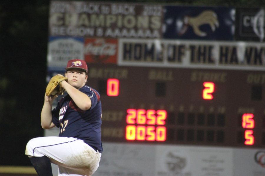 Carter Skelley, 9, pitching for the Mill Creek Hawks baseball team.