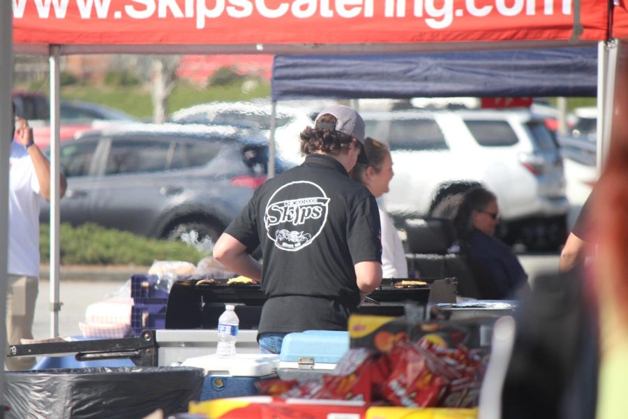 Skips Catering grilling food.