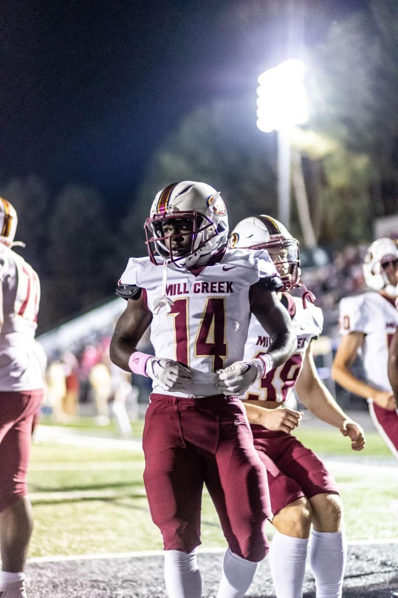 Malachi Miller ,11, running back on Varsity Football Team.