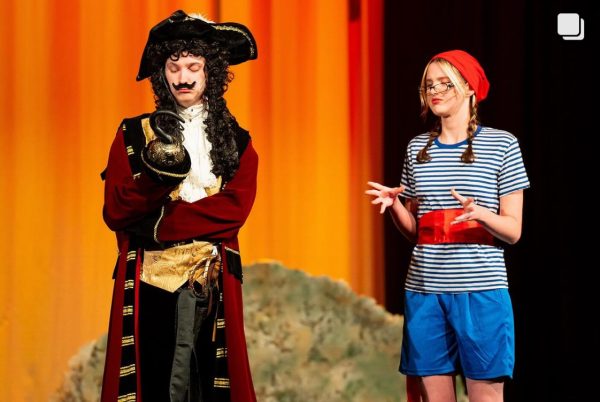 Hudson Rials, 12, alongside his co-star, Annie Smith, 11, in Peter Pan and Wendy as he plays Captain Hook and Smith plays Smee.