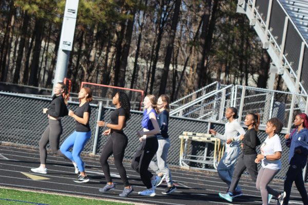 Track girls warming up at practice.
