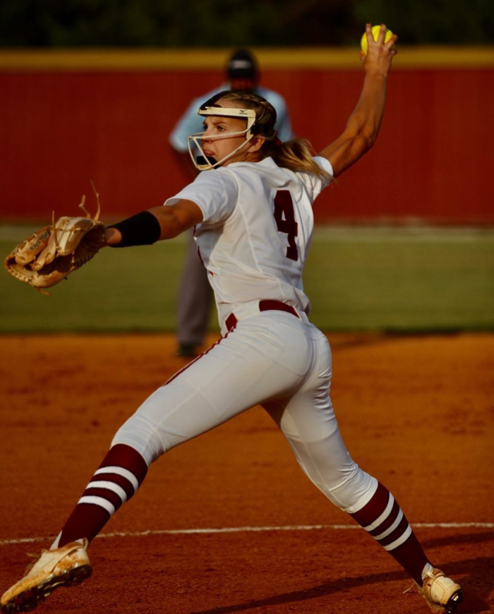 Sarah Woody, 12, pitching during a home game.