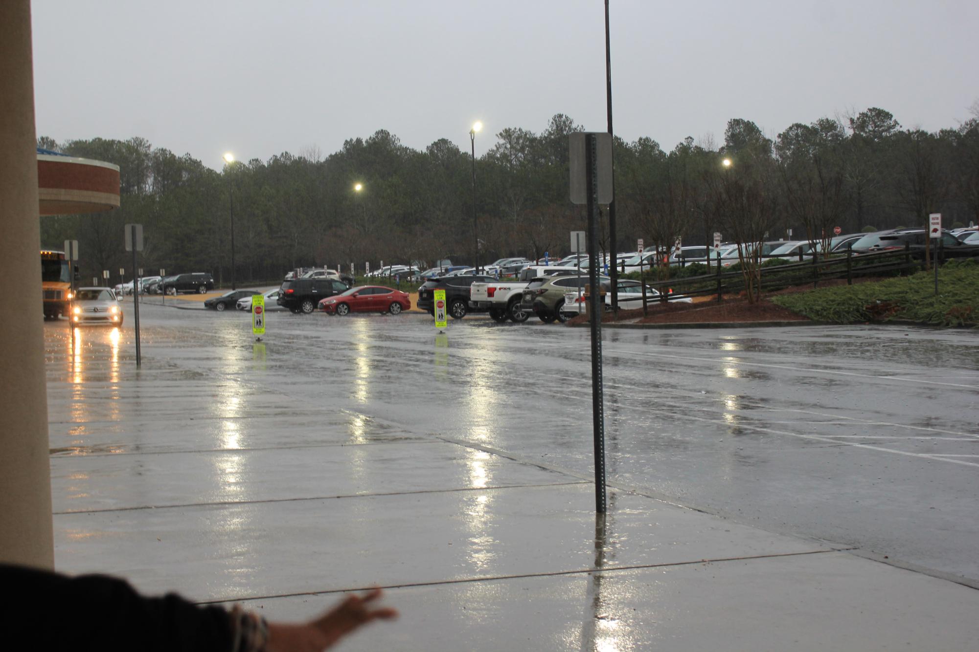Severe storms and wind, in the front of Mill Creek High School, during the late afternoon on Tuesday.