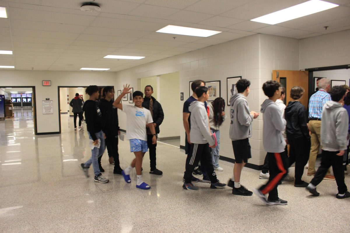 Middle school students touring the school on Thursday.