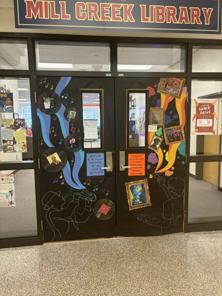 Media Center designed the main doors as  records and music as well as art done by African-Americans.