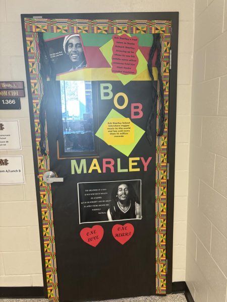 This door represents a Jamaican singer named Bob Marley. 