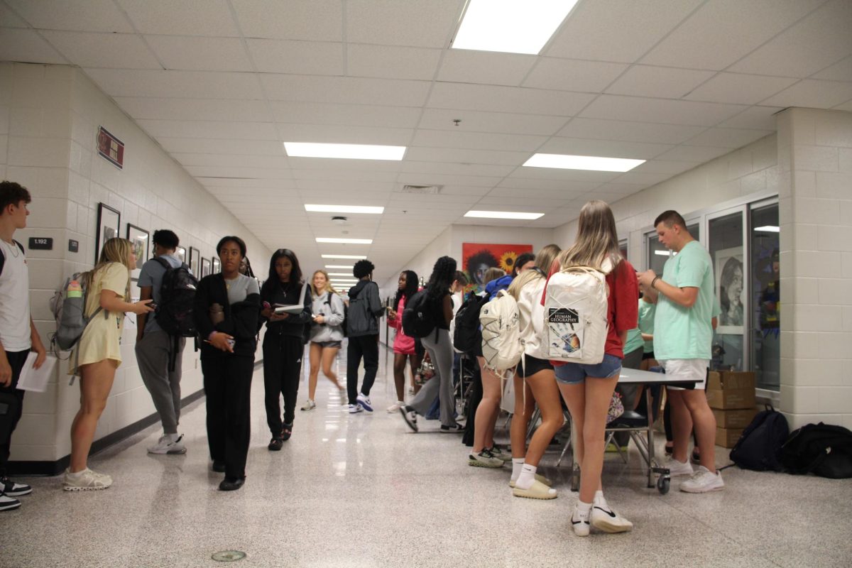 Mill Creek Students lining up to get their yearbook.