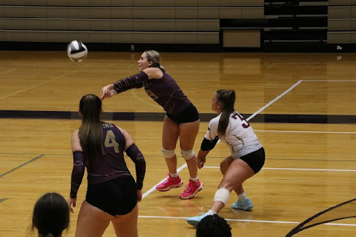 Mary Katherine Herold playing at recent varsity volleyball game. Photo provided by Herold. 