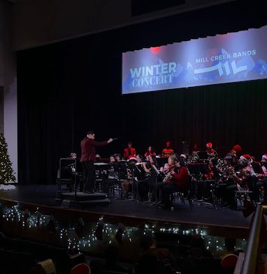 Associate Director Nolan Clark conducting the Symphonic Winds