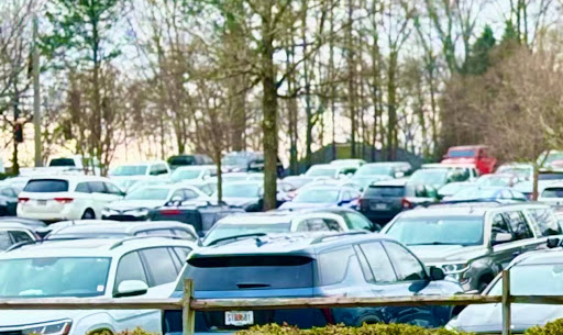 An overview of the Navy lot Parking space In Mill Creek High School on Jan 31, 2025