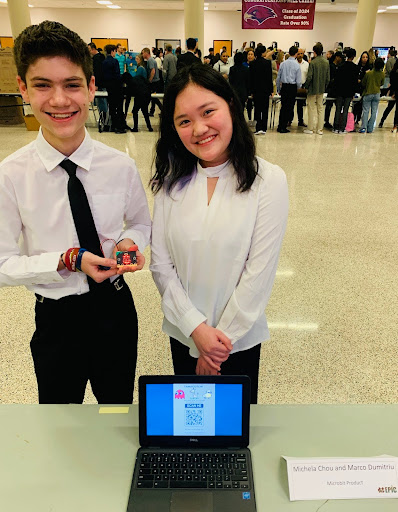 9th grade EPIC students Marco Dumitriu and Michela Chou present their Microbit project at EPIC Night on Feb. 27.
